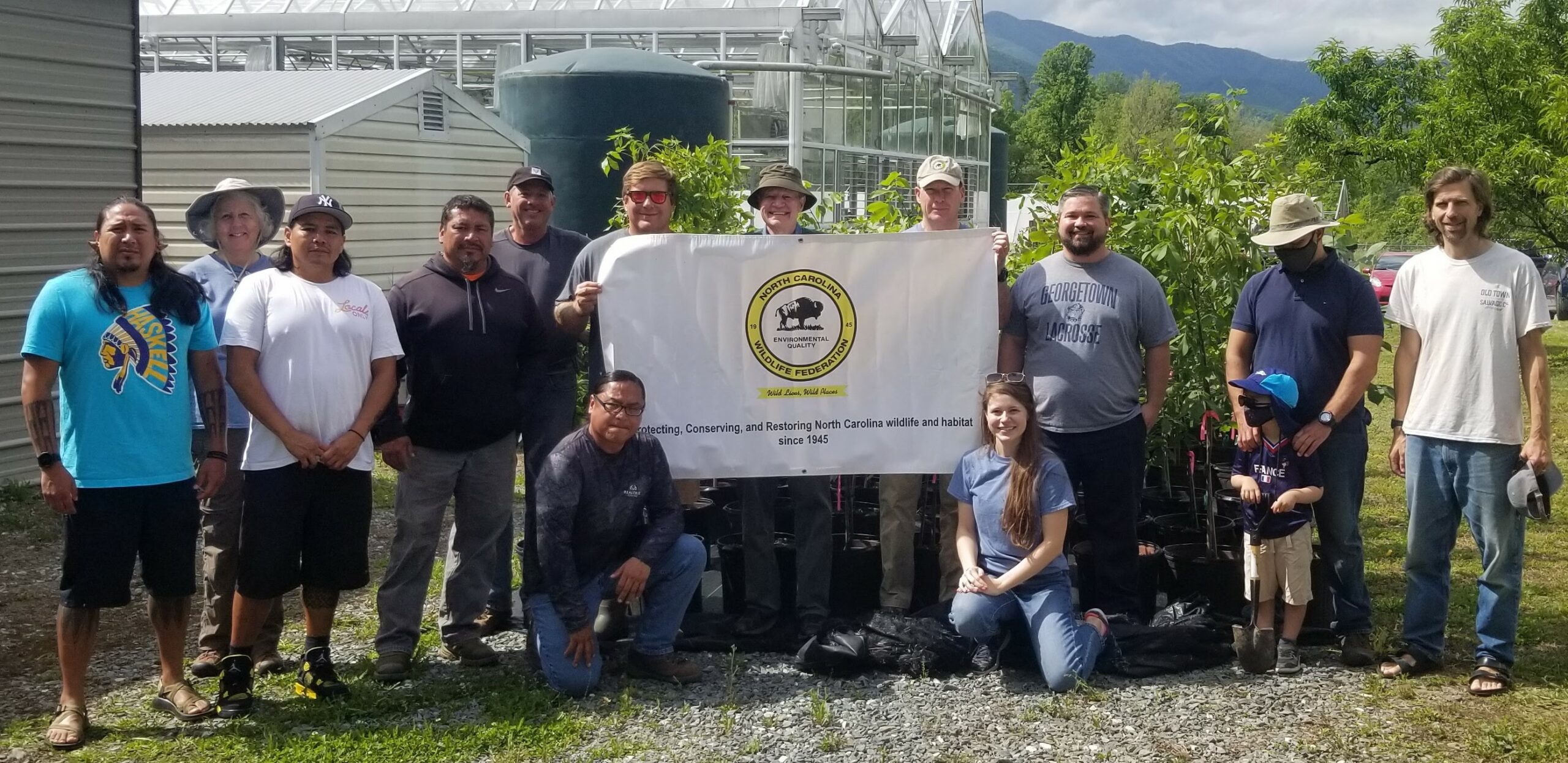 NCWF and Eastern Band of Cherokee Indians pose at planting event.