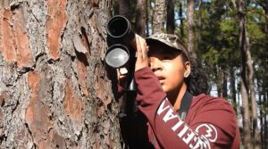 Lauren D. Pharr scoping out woodpeckers