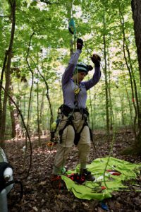 Michelle Kirchner gearing up for a treetop ascent