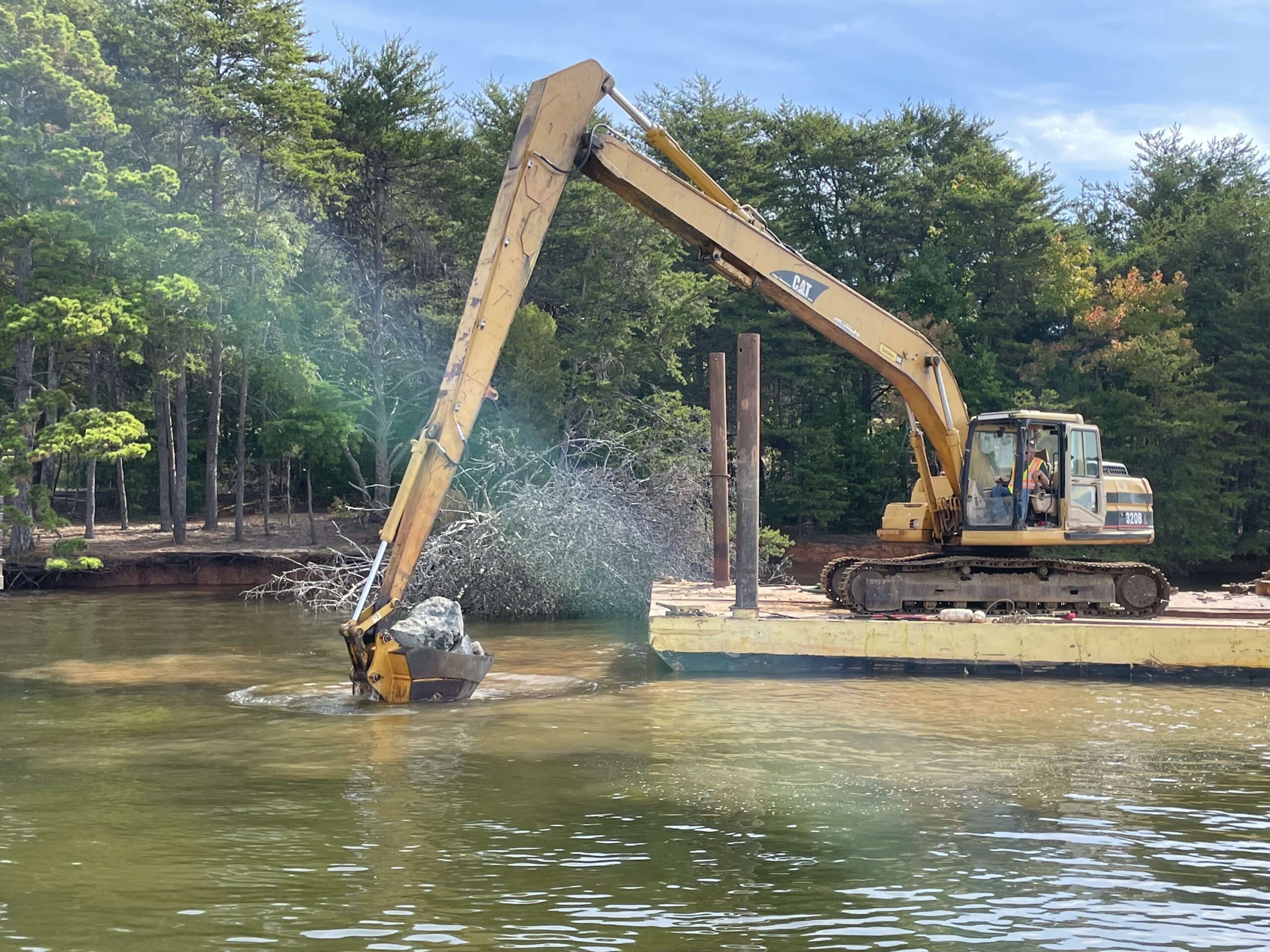 Excavator with rock