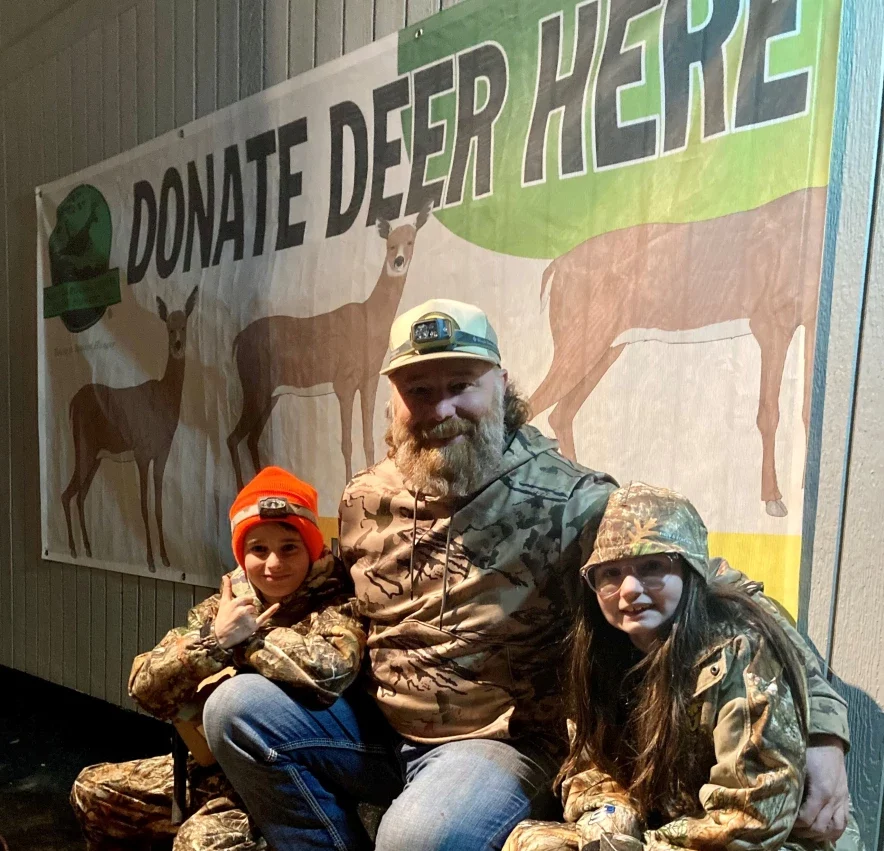Joey Dalessio and his children after their family hunting trip.